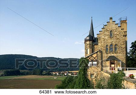 Castle against blue sky on landscape, Thuringia, Germany View Large Photo Image Stock Image - Castle against blue sky on landscape, Thuringia, Germany . Fotosearch