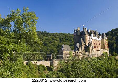 Castle on hill in forest, Burg Eltz, Germany View Large Photo Image Stock Image - Castle on hill in forest, Burg Eltz, Germany . Fotosearch