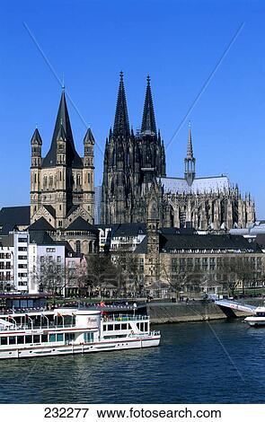 Cathedral at waterfront, Cologne Cathedral, Cologne, Rhine River, North Rhine Westphalia, Germany View Large Photo Image Stock Photo - Cathedral at waterfront, Cologne Cathedral, Cologne, Rhine River, North Rhine Westphalia, Germany . Fotosearch