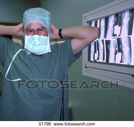 Stock Image - Chirurg in hospital . Fotosearch