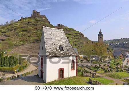 Stock Image - Church beneath the ruin of Niederburg Castle, Kobern-Gondorf, Germany . Fotosearch