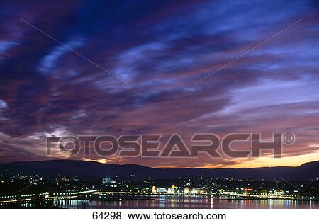 City at waterfront lit up at night, Lake Geneva, Switzerland View Large Photo Image Stock Photo - City at waterfront lit up at night, Lake Geneva, Switzerland . Fotosearch