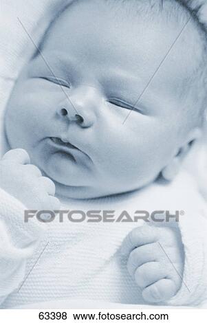 Close-up of a baby sleeping View Large Photo Image Stock Photo - Close-up of a baby sleeping . Fotosearch