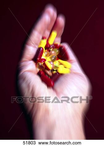 Close-up of a handful of pills View Large Photo Image Stock Image - Close-up of a handful of pills . Fotosearch