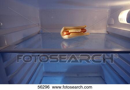 Close-up of a hot dog in a refrigerator View Large Photo Image Stock Photograph - Close-up of a hot dog in a refrigerator . Fotosearch