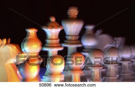 Close-up of chess pieces in row View Large Photo Image Stock Photograph - Close-up of chess pieces in row . Fotosearch