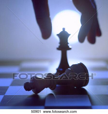 Close-up of chess pieces on chessboard View Large Photo Image Stock Image - Close-up of chess pieces on chessboard . Fotosearch