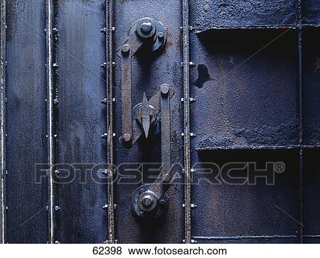 Close-up of closed rusted door of boiler View Large Photo Image Stock Photo - Close-up of closed rusted door of boiler . Fotosearch