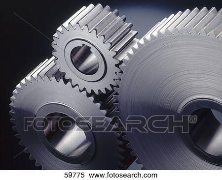 Stock Photography - Close-up of cog wheels . Fotosearch