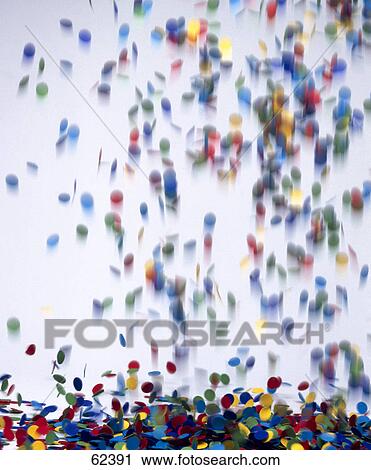 Close-up of confetti falling View Large Photo Image Stock Image - Close-up of confetti falling . Fotosearch