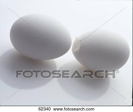 Stock Image - Close-up of cracked egg . Fotosearch