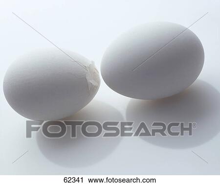 Close-up of cracked egg View Large Photo Image Stock Image - Close-up of cracked egg . Fotosearch