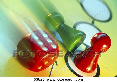 Close-up of dice and board game pieces View Large Photo Image Stock Photography - Close-up of dice and board game pieces . Fotosearch