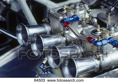 Close-up of engine of car View Large Photo Image Stock Image - Close-up of engine of car . Fotosearch