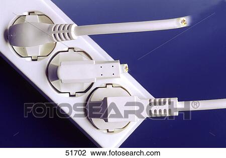 Close-up of extension cords plugged into extension socket View Large Photo Image Stock Image - Close-up of extension cords plugged into extension socket . Fotosearch