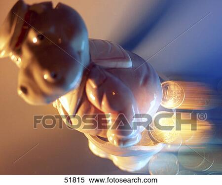 Close-up of figurine of hippopotamus and European Union coins View Large Photo Image Stock Photography - Close-up of figurine of hippopotamus and European Union coins . Fotosearch