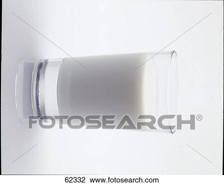 Close-up of glass of milk View Large Photo Image Stock Image - Close-up of glass of milk . Fotosearch