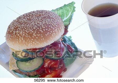 Close-up of hamburger and cup of black coffee View Large Photo Image Stock Photography - Close-up of hamburger and cup of black coffee . Fotosearch