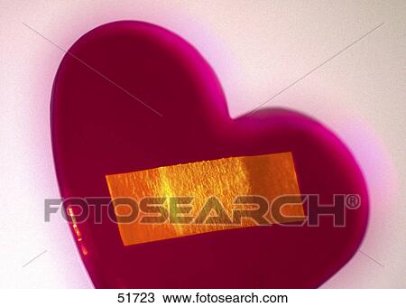 Close-up of heart and bandage View Large Photo Image Stock Image - Close-up of heart and bandage . Fotosearch