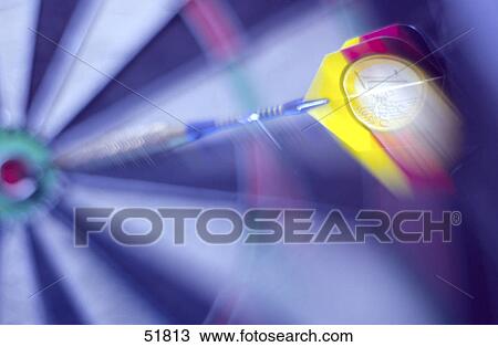 Close-up of one euro coin on dartboard View Large Photo Image Stock Image - Close-up of one euro coin on dartboard . Fotosearch