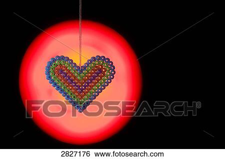 Stock Photograph - Close-up of pearls forming heart shape . Fotosearch