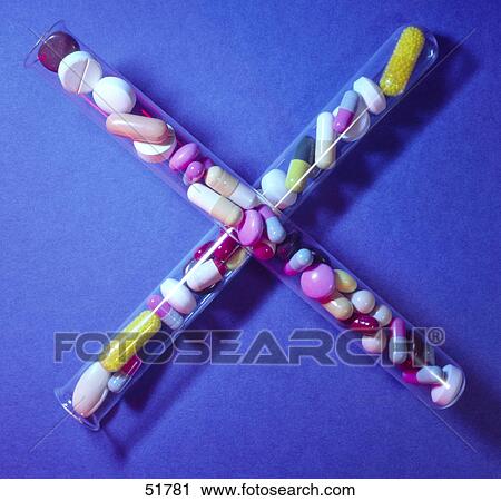 Close-up of pill bottle forming x sign View Large Photo Image Stock Image - Close-up of pill bottle forming x sign . Fotosearch