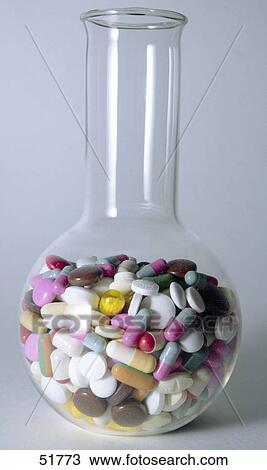 Close-up of pills and capsules in flask View Large Photo Image Stock Image - Close-up of pills and capsules in flask . Fotosearch