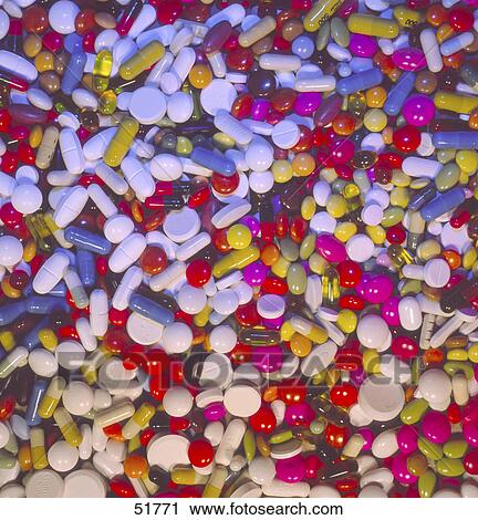 Stock Image - Close-up of pills and capsules . Fotosearch