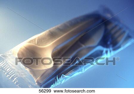 Stock Photo - Close-up of plastic spoon, fork and knife in a pouch . Fotosearch