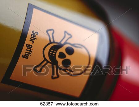 Close-up of poison bottle with skull and crossbones View Large Photo Image Stock Photo - Close-up of poison bottle with skull and crossbones . Fotosearch