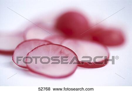 Close-up of slices of radishes View Large Photo Image Stock Photo - Close-up of slices of radishes . Fotosearch