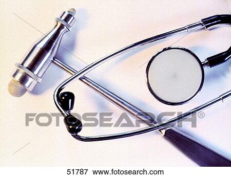 Close-up of stethoscope and mallet View Large Photo Image Stock Photo - Close-up of stethoscope and mallet . Fotosearch