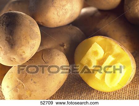 Stock Photo - Close-up of the word bio etched on a potato . Fotosearch