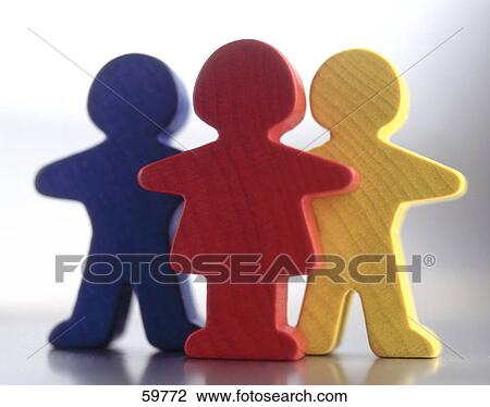 Stock Image - Close-up of three figurines . Fotosearch