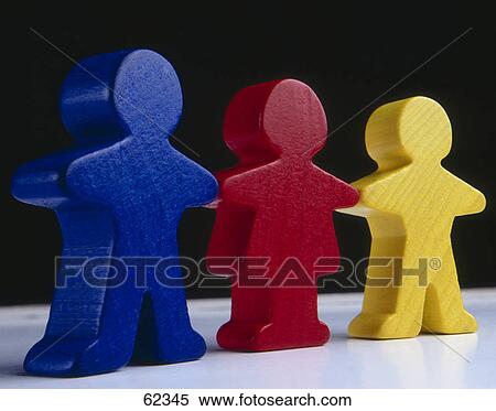 Close-up of three figurines View Large Photo Image Stock Photography - Close-up of three figurines . Fotosearch