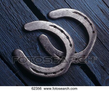 Stock Photograph - Close-up of two horseshoes . Fotosearch