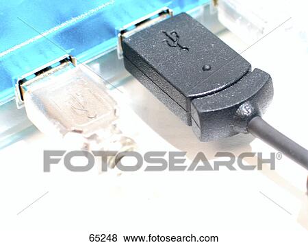 Stock Photo - Close-up of USB cable plugged into laptop . Fotosearch