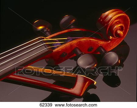 Close-up of violin and bow View Large Photo Image Stock Photo - Close-up of violin and bow . Fotosearch