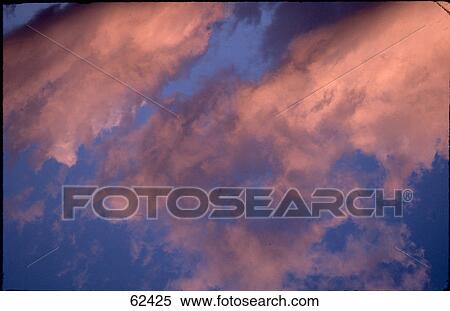 Clouds in sky View Large Photo Image Stock Photography - Clouds in sky . Fotosearch