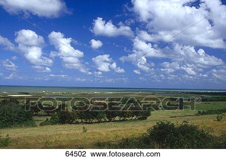Clouds over landscape, Normandy, France View Large Photo Image Stock Image - Clouds over landscape, Normandy, France . Fotosearch