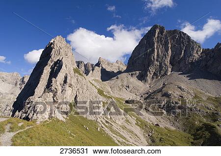Stock Image - Clouds over mountain . Fotosearch