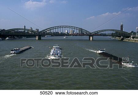 Containers ships in river, Rhine River, Dusseldorf, Germany View Large Photo Image Stock Image - Containers ships in river, Rhine River, Dusseldorf, Germany . Fotosearch