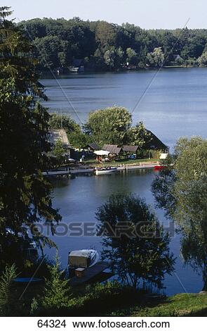 Country houses on lakeside, Lake Schwarzer See, Flecken Zechlin, Brandenburg, Germany View Large Photo Image Picture - Country houses on lakeside, Lake Schwarzer See, Flecken Zechlin, Brandenburg, Germany . Fotosearch