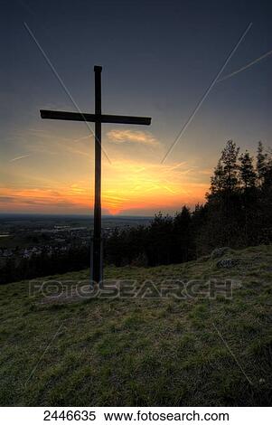 Cross in field at dusk, Germany View Large Photo Image Stock Photography - Cross in field at dusk, Germany . Fotosearch
