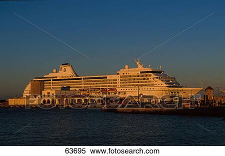 Stock Photography - Cruise ship moored at harbor, Dodecanese Islands, Greece . Fotosearch