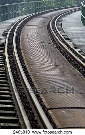Curving railroad track View Large Photo Image Stock Image - Curving railroad track . Fotosearch