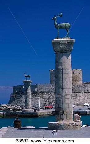 Stock Image - Deer sculptures on columns of fort, Fort Of St. Nicholas, Dodecanese Islands, Greece . Fotosearch
