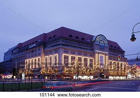 Picture - Department store lit up at dusk, Berlin, Germany . Fotosearch