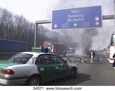 Fire engine near car accident on road View Large Photo Image Stock Image - Fire engine near car accident on road . Fotosearch