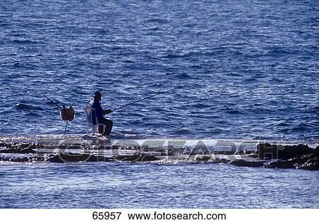 Fisherman fishing at coast, Lebanon View Large Photo Image Stock Photo - Fisherman fishing at coast, Lebanon . Fotosearch